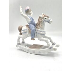 Vintage 1991 Paul‎ Sebastian Porcelain Boy on Rocking Horse Figurine